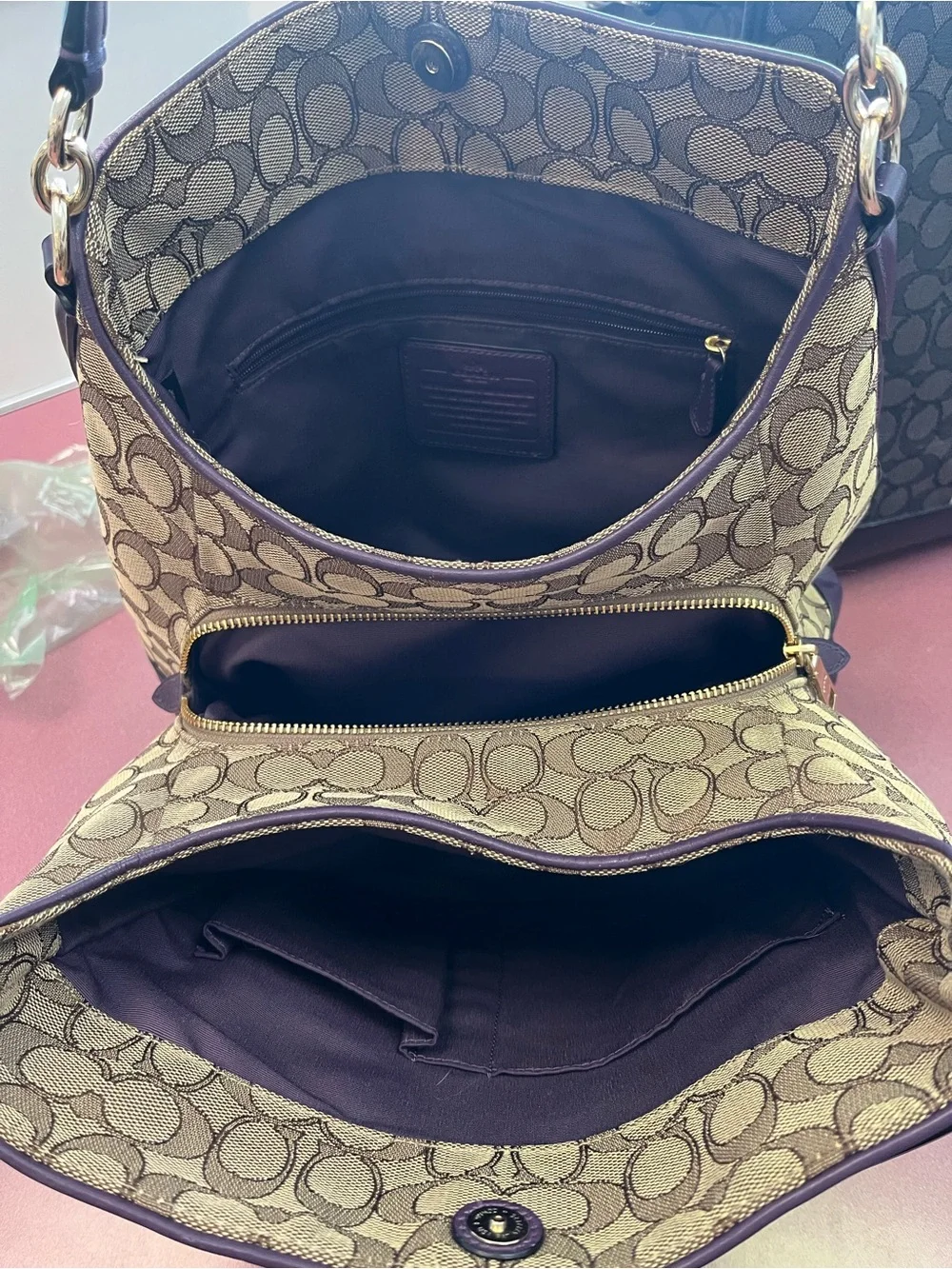Coach Brown Signature Jacquard Shoulder Bag with Purple Trim. 3 compartments.GUC